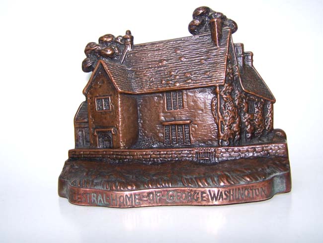A rare pair of Antique Bookends circa 1922 depicting the Ancestral Home of George Washington